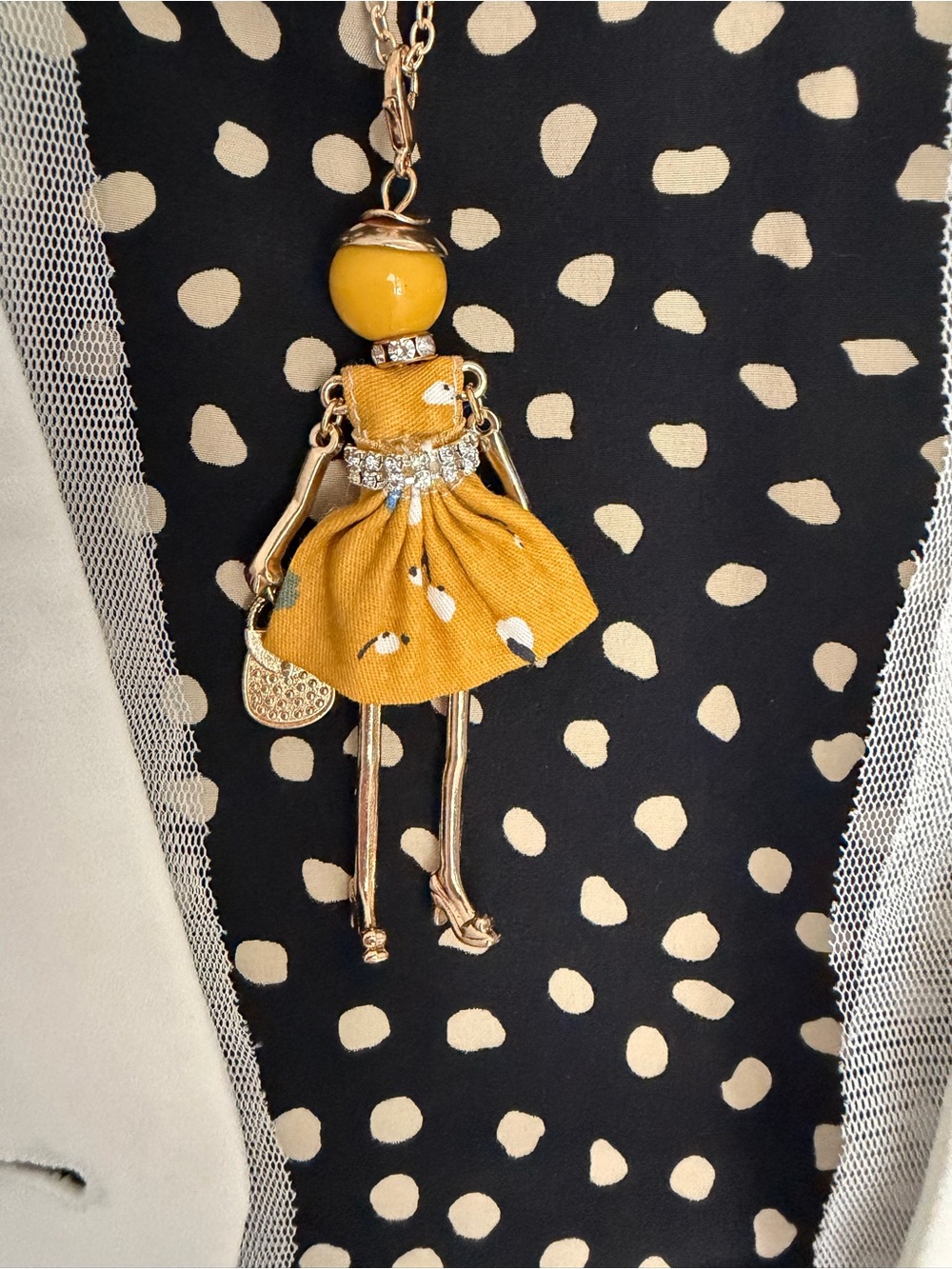 Doll necklace pendant mustard New With Tags